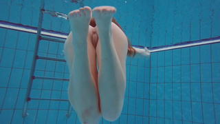 Ravishing Polish teenie Alice swimming without clothes on