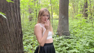 Ravishing smoking babe in the forest was slammed in behind and pissed in her mouth